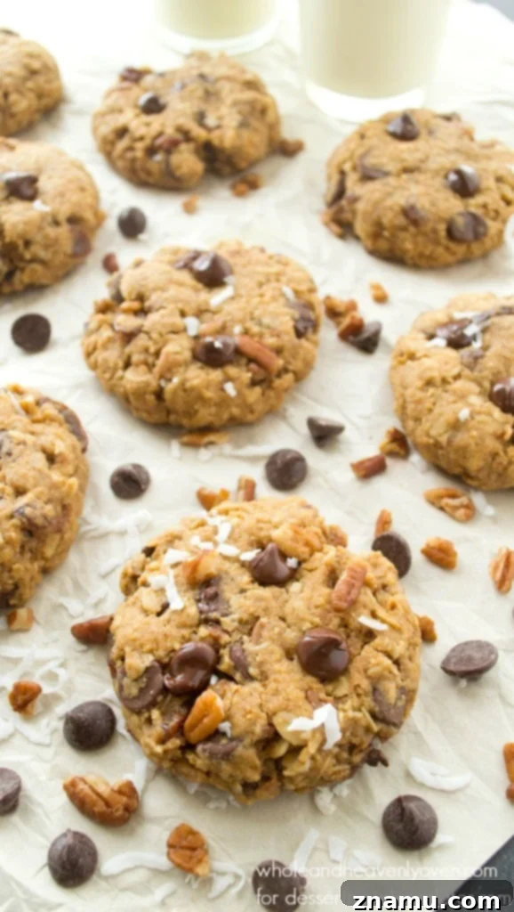 Ultimate Everything Cookies 4 Stack of Soft-Baked Kitchen Sink Cookies on a wire rack