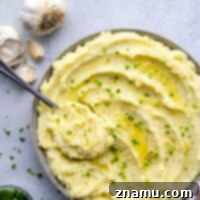 Velvety Garlic Mashed Potatoes 8 Perfectly creamy and mashed with a rich garlic butter and fresh chives, these garlic mashed potatoes are an easy side dish and go well with so many dishes!