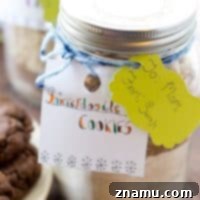 A selection of three different cookie types: Double-Chocolate Peanut Butter, Oatmeal Cranberry Cashew, and Snickerdoodle.