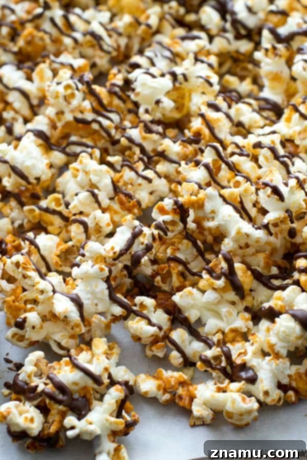 Chocolate Peanut Caramel Popcorn Crunch 8 Pile of homemade chocolate peanut caramel popcorn, an ideal snack