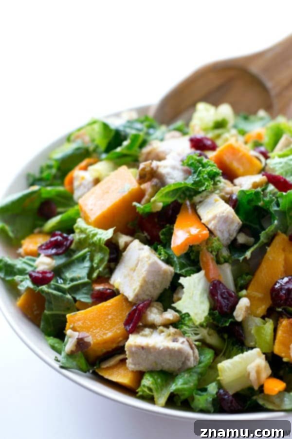 Harvest Gold Turkey Toss 6 Close-up of cooked butternut squash cubes, a key superfood in the healthy salad.