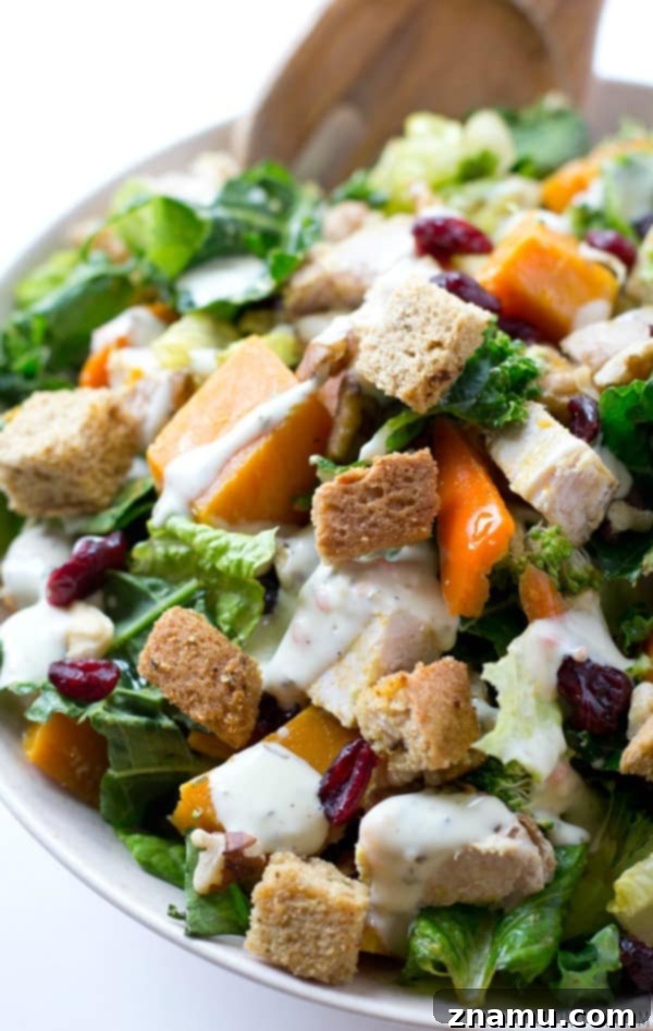 Harvest Gold Turkey Toss 9 Close-up of a serving of Butternut Squash Turkey Tossed Salad, showcasing fresh ingredients.