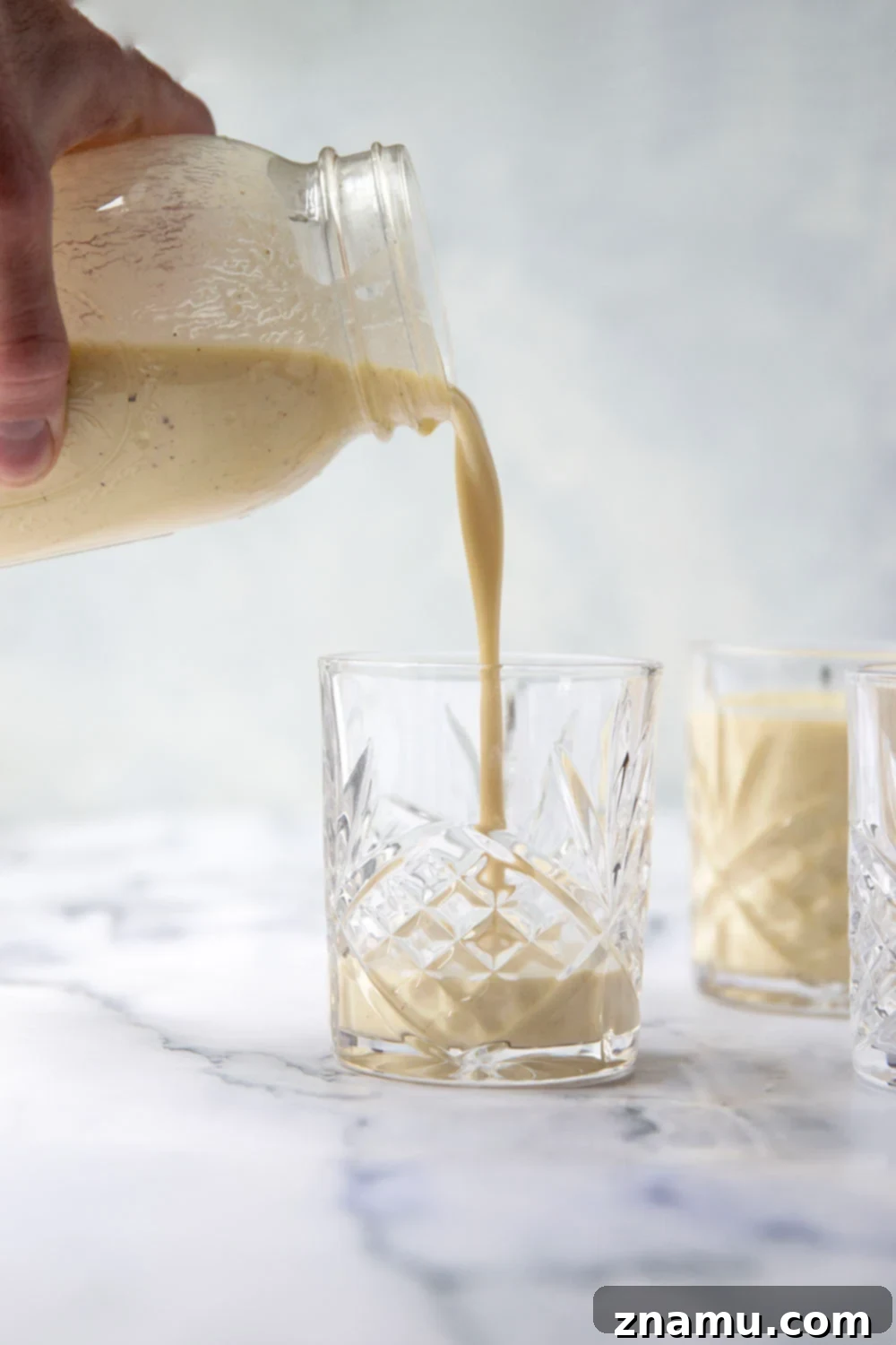 Rich Homemade Eggnog 3 Homemade Eggnog - Creamy texture with fresh nutmeg