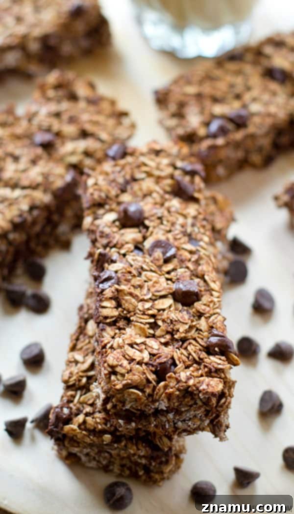 Ingredients for making healthy banana chocolate granola bars, including mashed bananas, oats, and chocolate chips. @WholeHeavenly