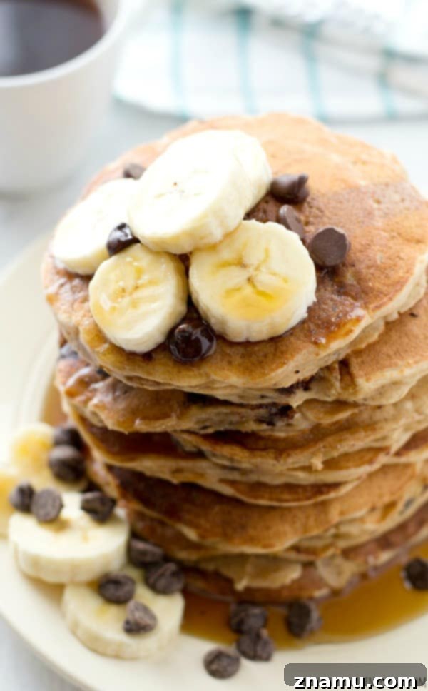 Hearty Banana Oatmeal Chocolate Chip Pancakes 5 Close-up shot showing the texture of a banana oatmeal pancake