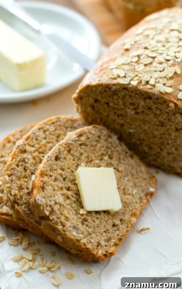 Hearty Homemade Multi-Grain Sandwich Loaf 8 A slice of hearty multi-grain bread on a plate