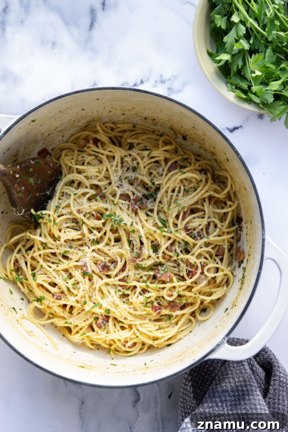 Ultimate Bacon Spaghetti Carbonara 6 This classic spaghetti carbonara features crispy bacon bits and tender spaghetti noodles in a rich and creamy Parmesan egg sauce. Ready in minutes and goes well with any meal!