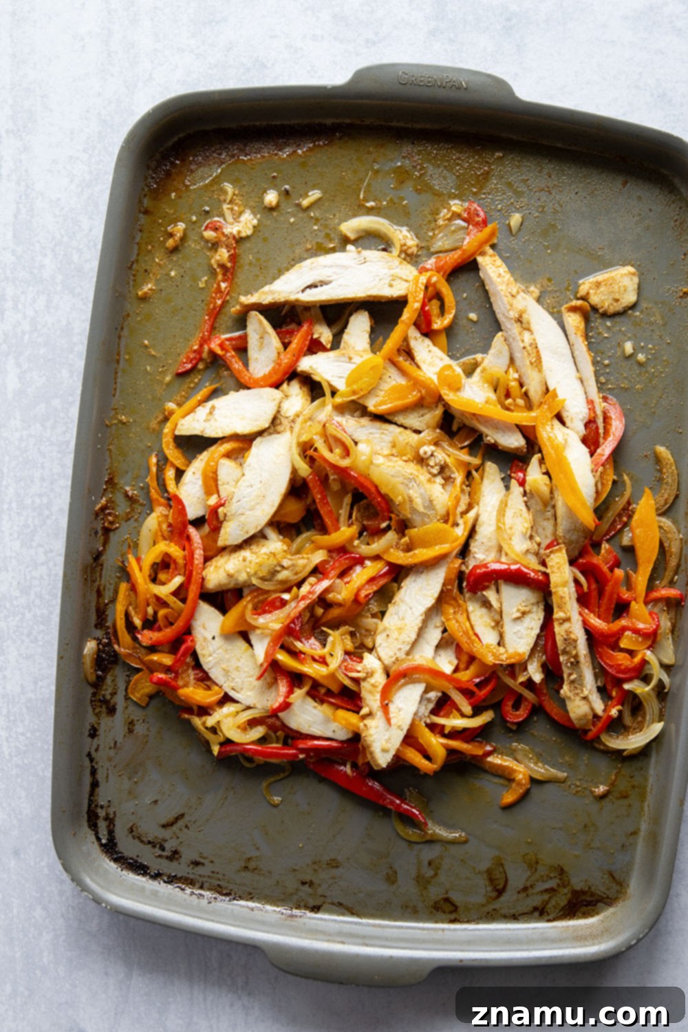 Zesty Chicken Fajita Rice Bowls 3 Everything you love about classic chicken fajitas are piled into these chicken fajita rice bowls that are made on a sheet pan for less mess and easy to meal prep!