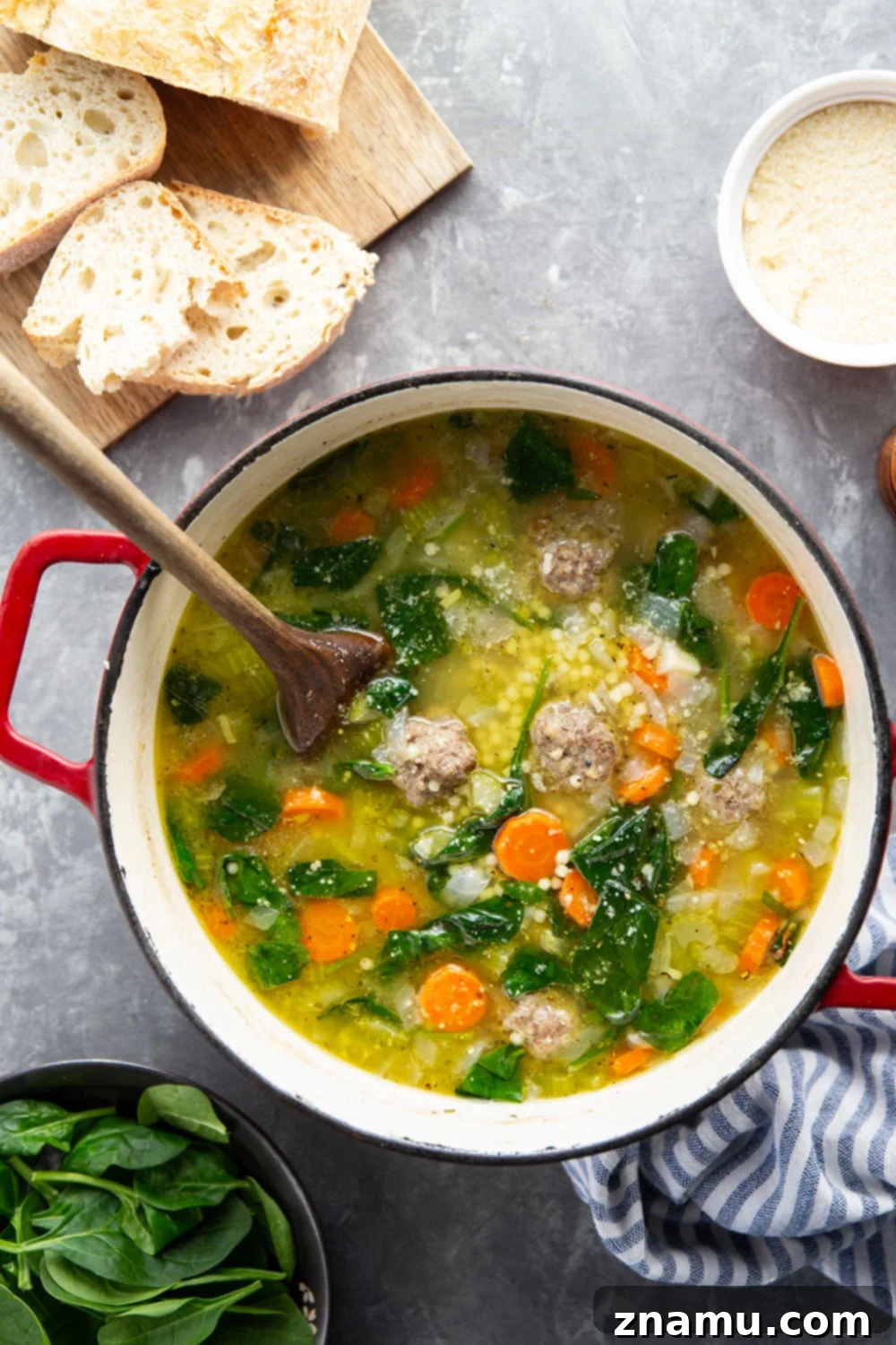 Classic Italian Wedding Soup 2 This hearty Italian wedding soup is packed full of juicy Italian sausage meatballs, tender pasta, and lots of veggies in a rich broth. Top bowls with lots of Parmesan and serve with thick bread slices for dipping.