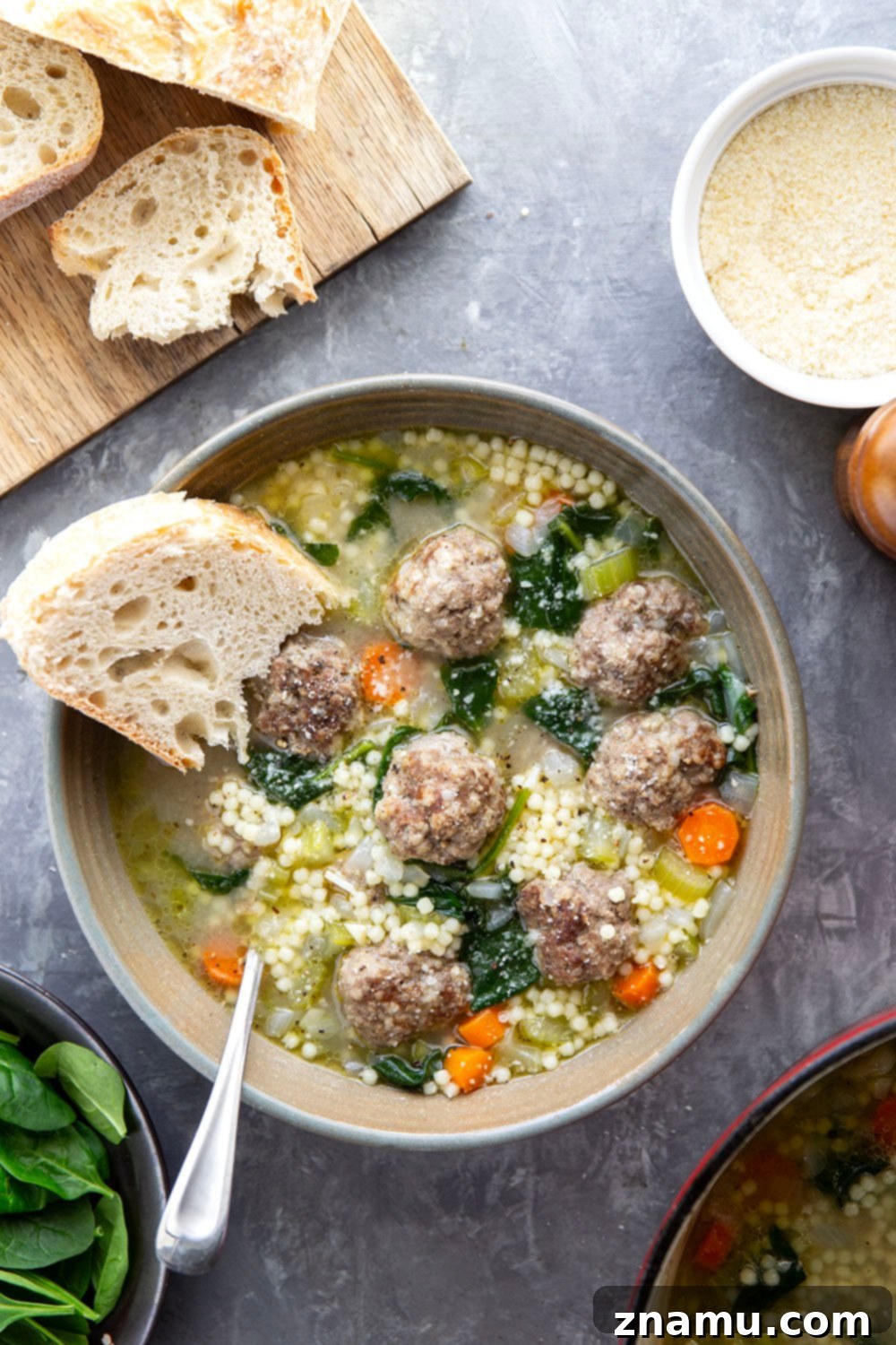 Classic Italian Wedding Soup 4 This hearty Italian wedding soup is packed full of juicy Italian sausage meatballs, tender pasta, and lots of veggies in a rich broth. Top bowls with lots of Parmesan and serve with thick bread slices for dipping.