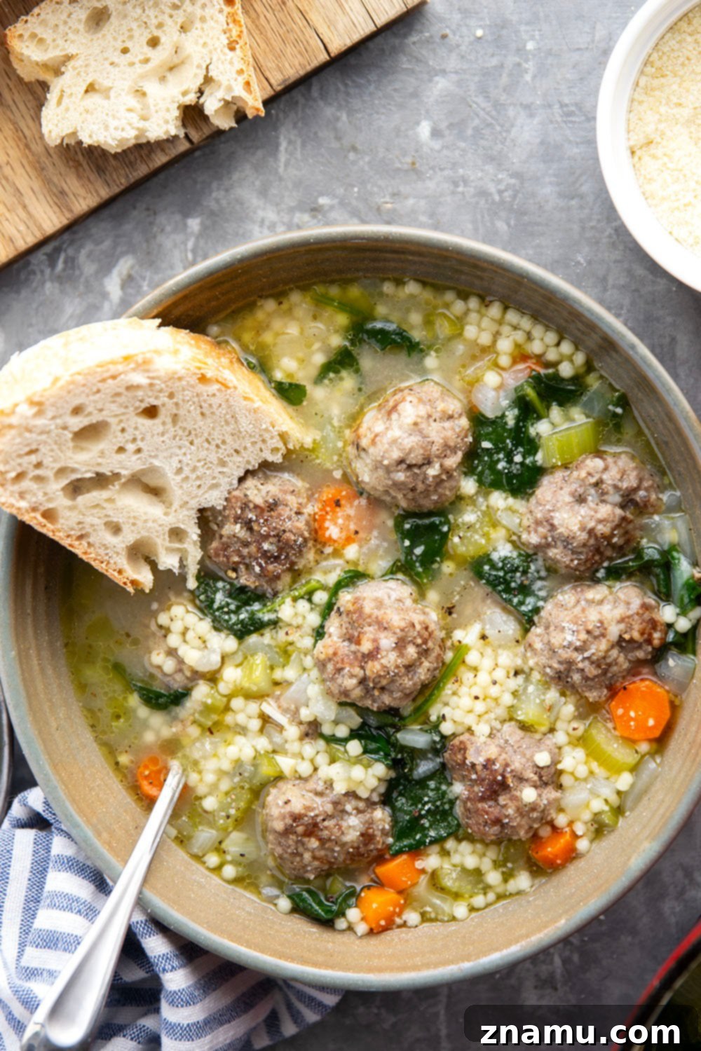 Classic Italian Wedding Soup 6 This hearty Italian wedding soup is packed full of juicy Italian sausage meatballs, tender pasta, and lots of veggies in a rich broth. Top bowls with lots of Parmesan and serve with thick bread slices for dipping.