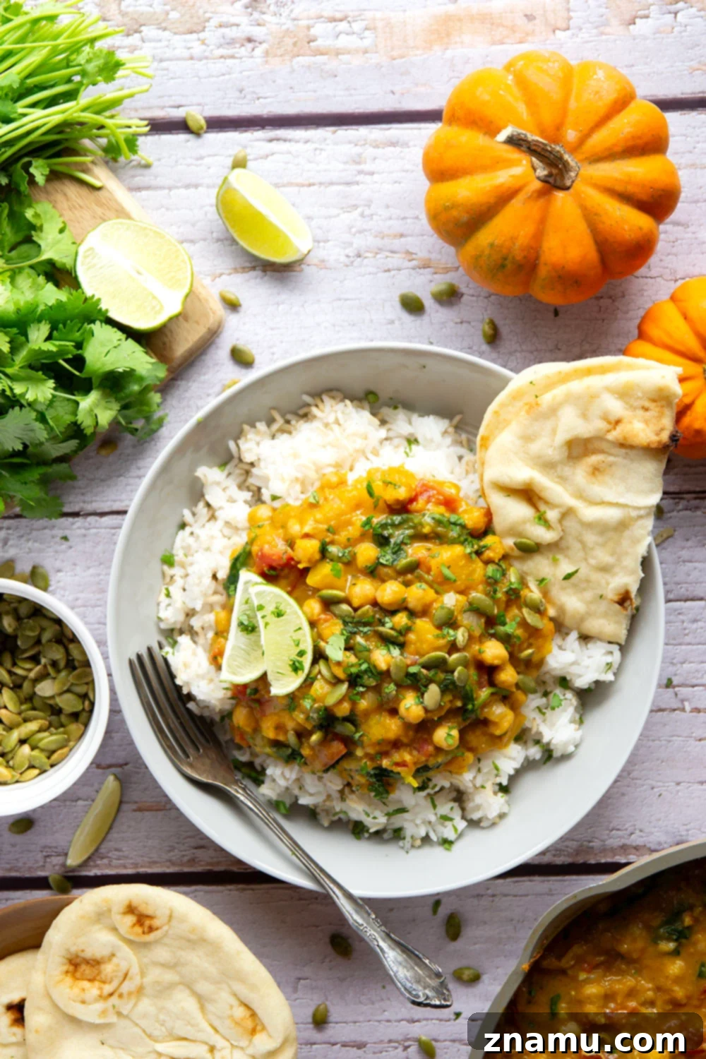 Heartwarming Roasted Pumpkin Chickpea Curry 2 Creamy roasted pumpkin and tender chickpeas make for the best combination in this fall-flavored pumpkin chickpea curry that's vegetarian and vegan-friendly!