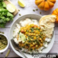 Creamy roasted pumpkin and tender chickpeas make for the best combination in this fall-flavored pumpkin chickpea curry that's vegetarian and vegan-friendly!