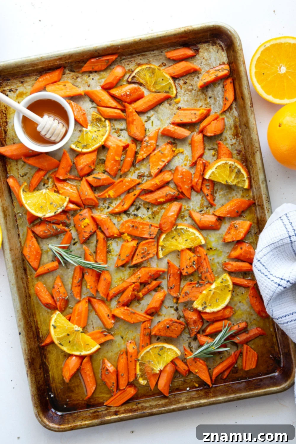 Glazed Honey Orange Roasted Carrots 2 Glazed in a sweet and citrusy honey orange sauce and roasted until perfectly tender, these honey orange roasted carrots are an easy side dish that always pleases.