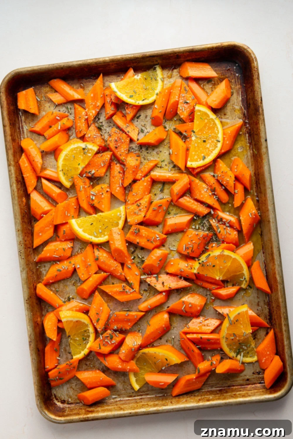Glazed Honey Orange Roasted Carrots 3 Glazed in a sweet and citrusy honey orange sauce and roasted until perfectly tender, these honey orange roasted carrots are an easy side dish that always pleases.