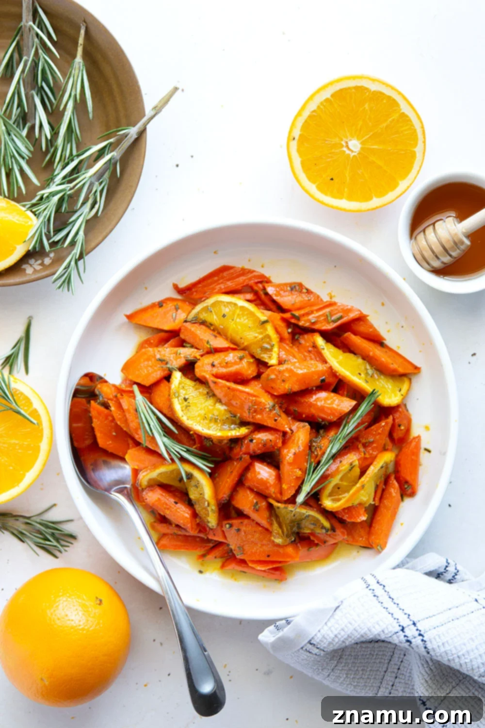 Glazed Honey Orange Roasted Carrots 4 Glazed in a sweet and citrusy honey orange sauce and roasted until perfectly tender, these honey orange roasted carrots are an easy side dish that always pleases.