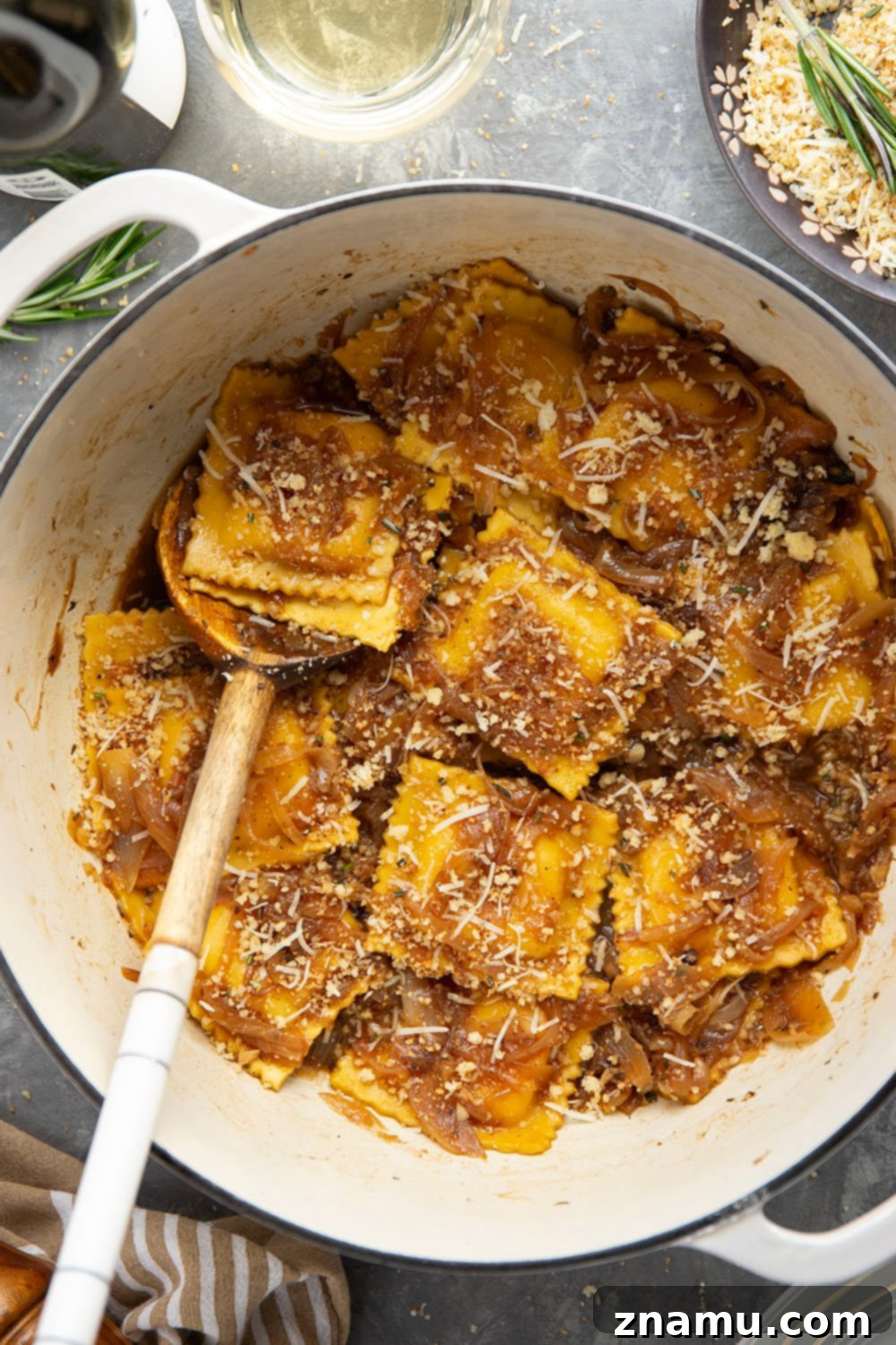Caramelized Onion Ravioli with Crispy Asiago Crumbs 4 Serving of French Onion Ravioli Garnished with Asiago Breadcrumbs