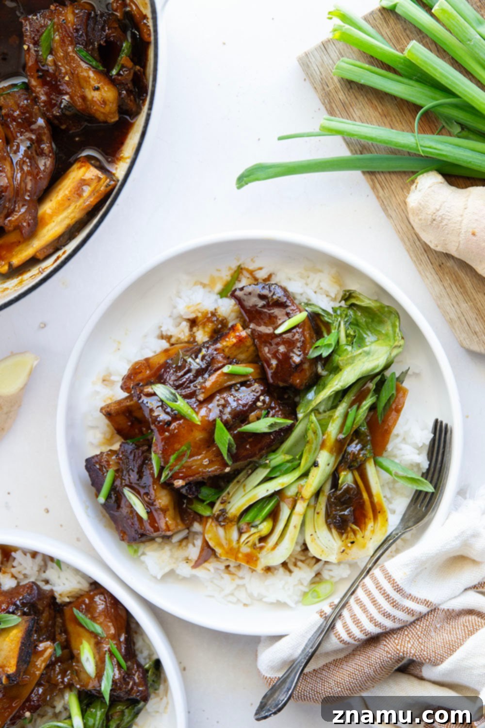Ginger-Soy Infused Short Ribs 2 Ginger Soy Braised Short Ribs served over rice with bok choy