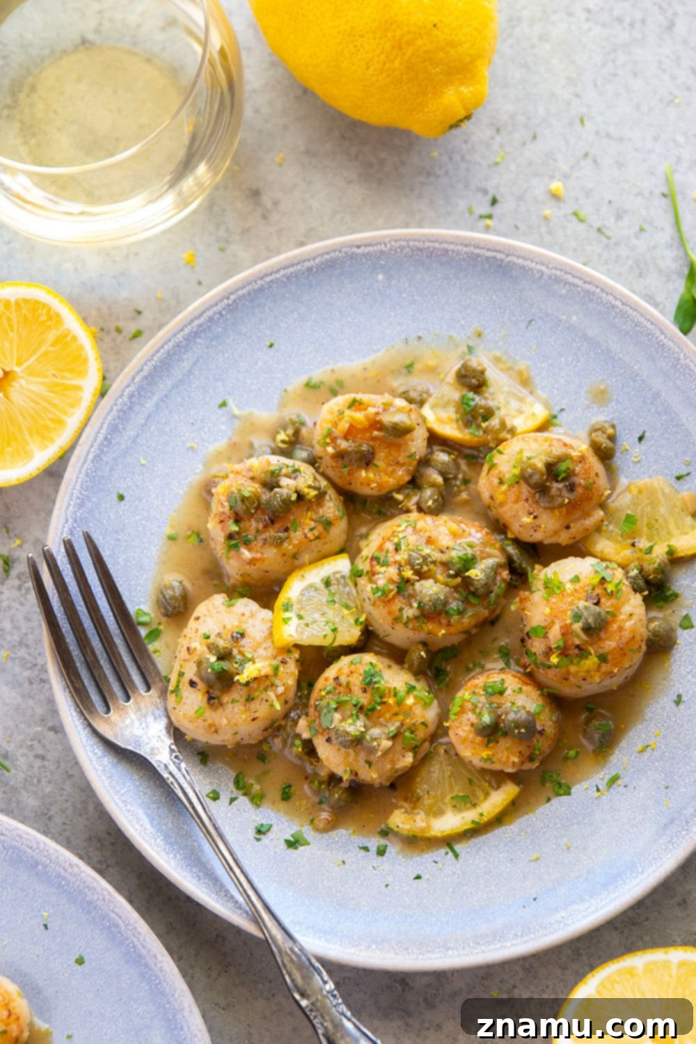 Lemon-Kissed Scallops with Caper Burst 4 Serving of Seared Scallops with Lemon Caper Sauce