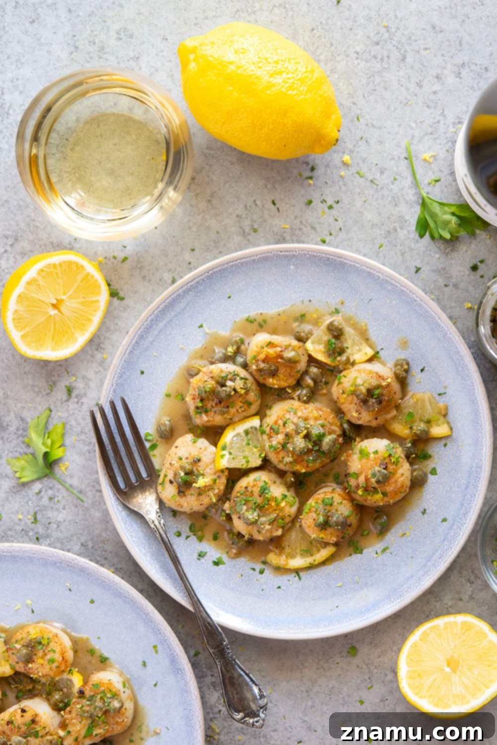 Lemon-Kissed Scallops with Caper Burst 6 Plated Seared Scallops with Lemon Caper Sauce