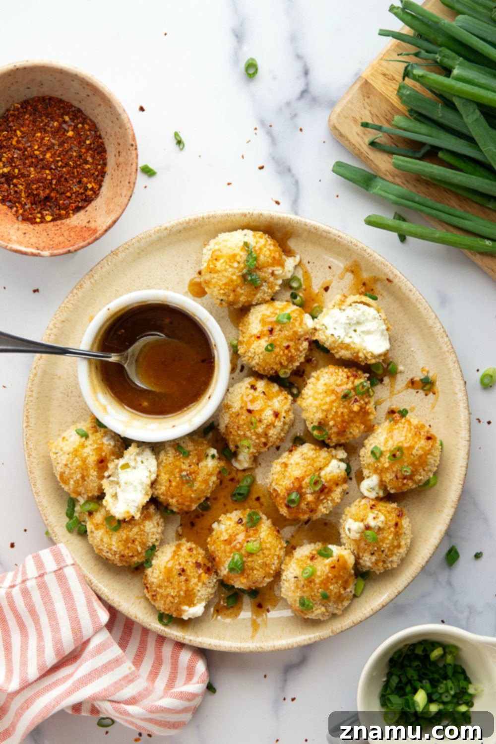 Air Fryer Goat Cheese Bites with Spicy Honey Drizzle 3 Close-up of Air Fryer Goat Cheese Balls