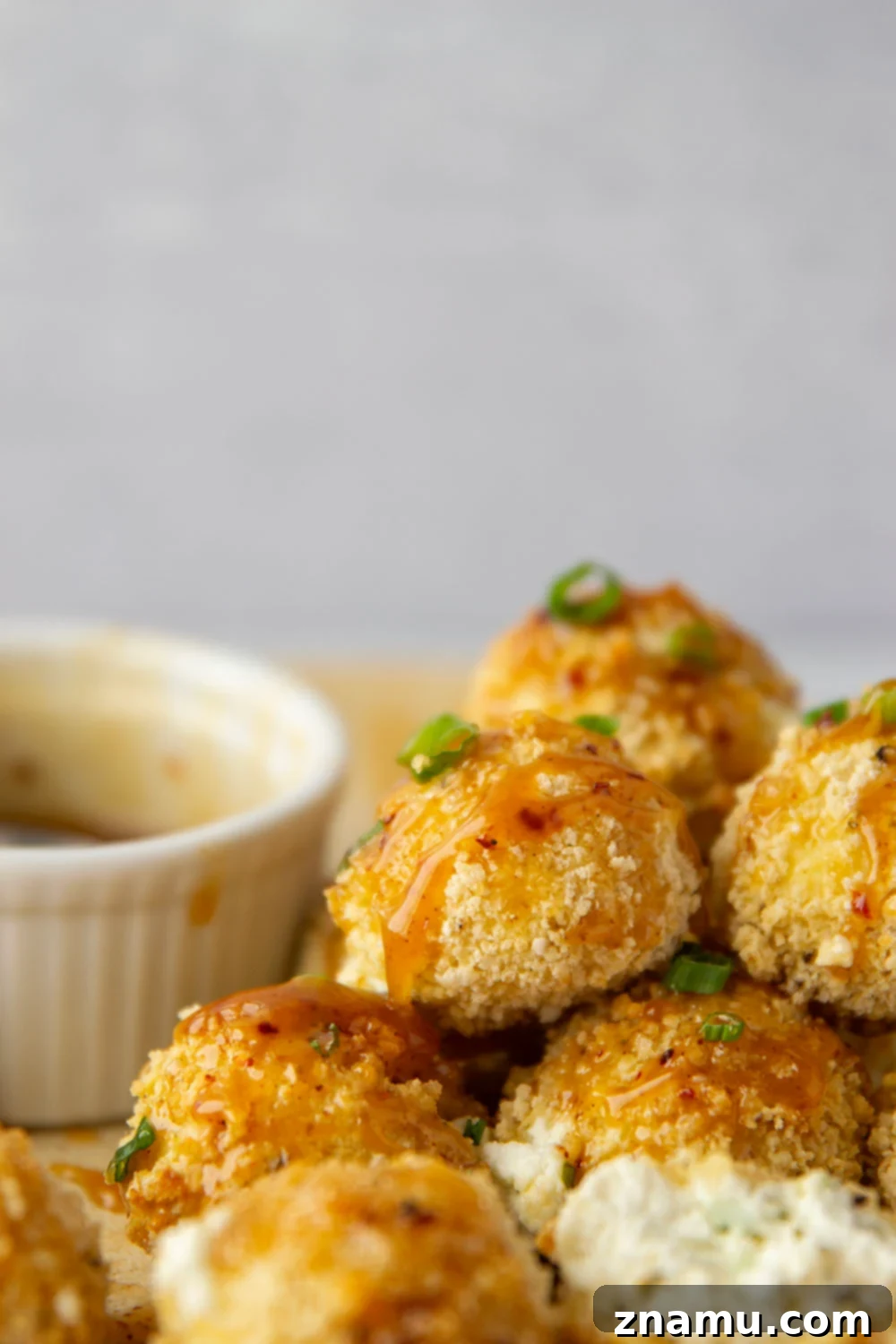 Air Fryer Goat Cheese Bites with Spicy Honey Drizzle 4 Air Fryer Goat Cheese Balls with Hot Honey drizzle