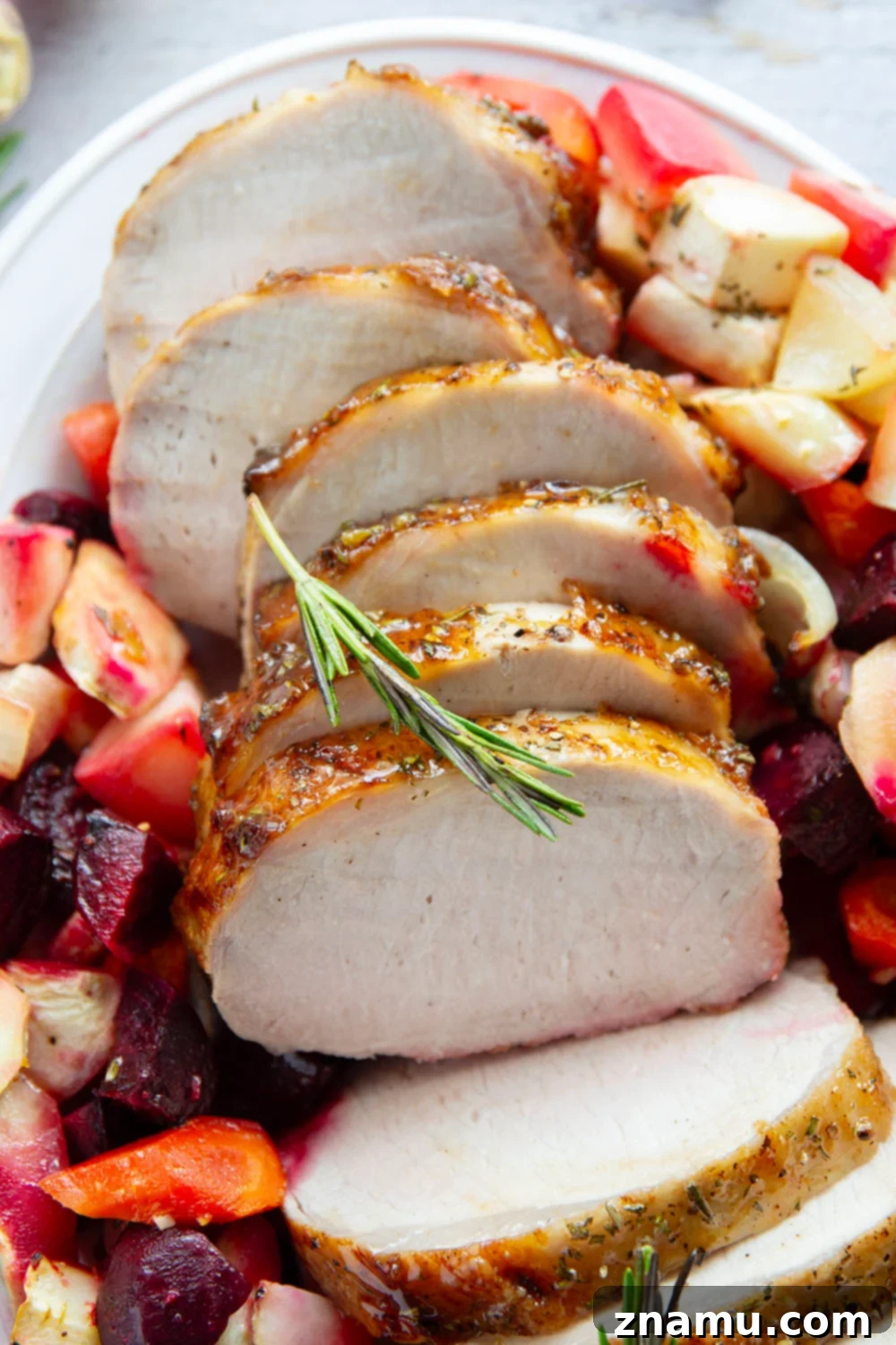 Maple-Glazed Pork Loin Roast with Roasted Root Vegetables 6 Sliced Maple Glazed Pork Loin with Root Vegetables