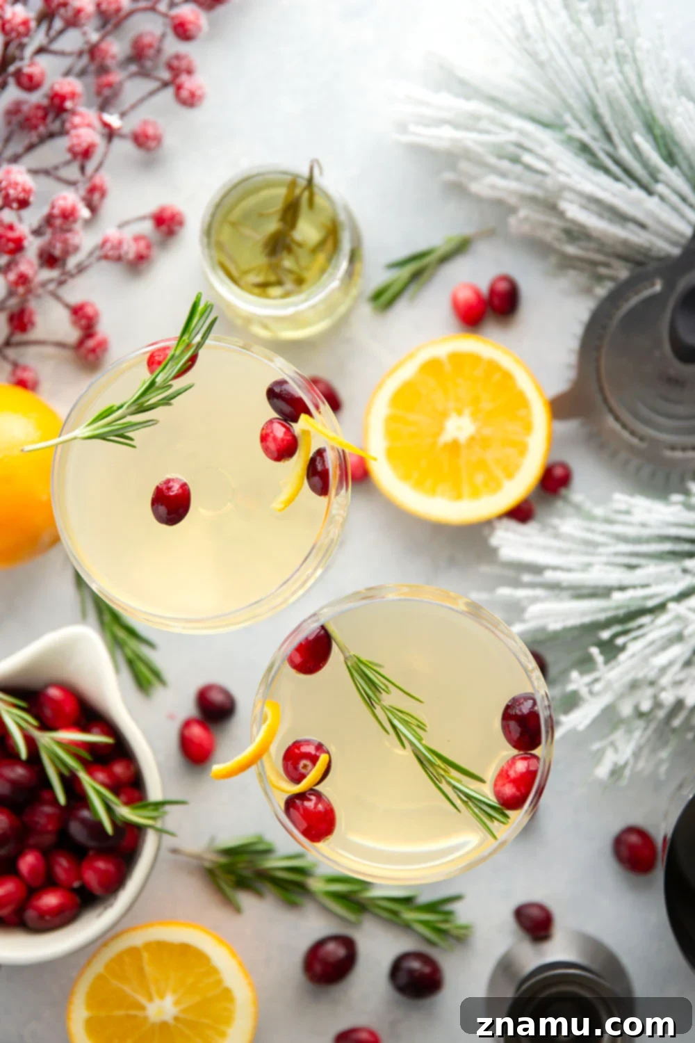 White Cranberry Cosmo Cocktail 3 Homemade White Cranberry Cosmo with Rosemary Syrup and Orange Twist