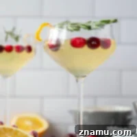 White Cranberry Cosmo Cocktail 8 Tangy white cranberry juice, fragrant homemade rosemary syrup, and just a kiss of fresh orange flavor come together in this holiday-worthy white cranberry cosmo.