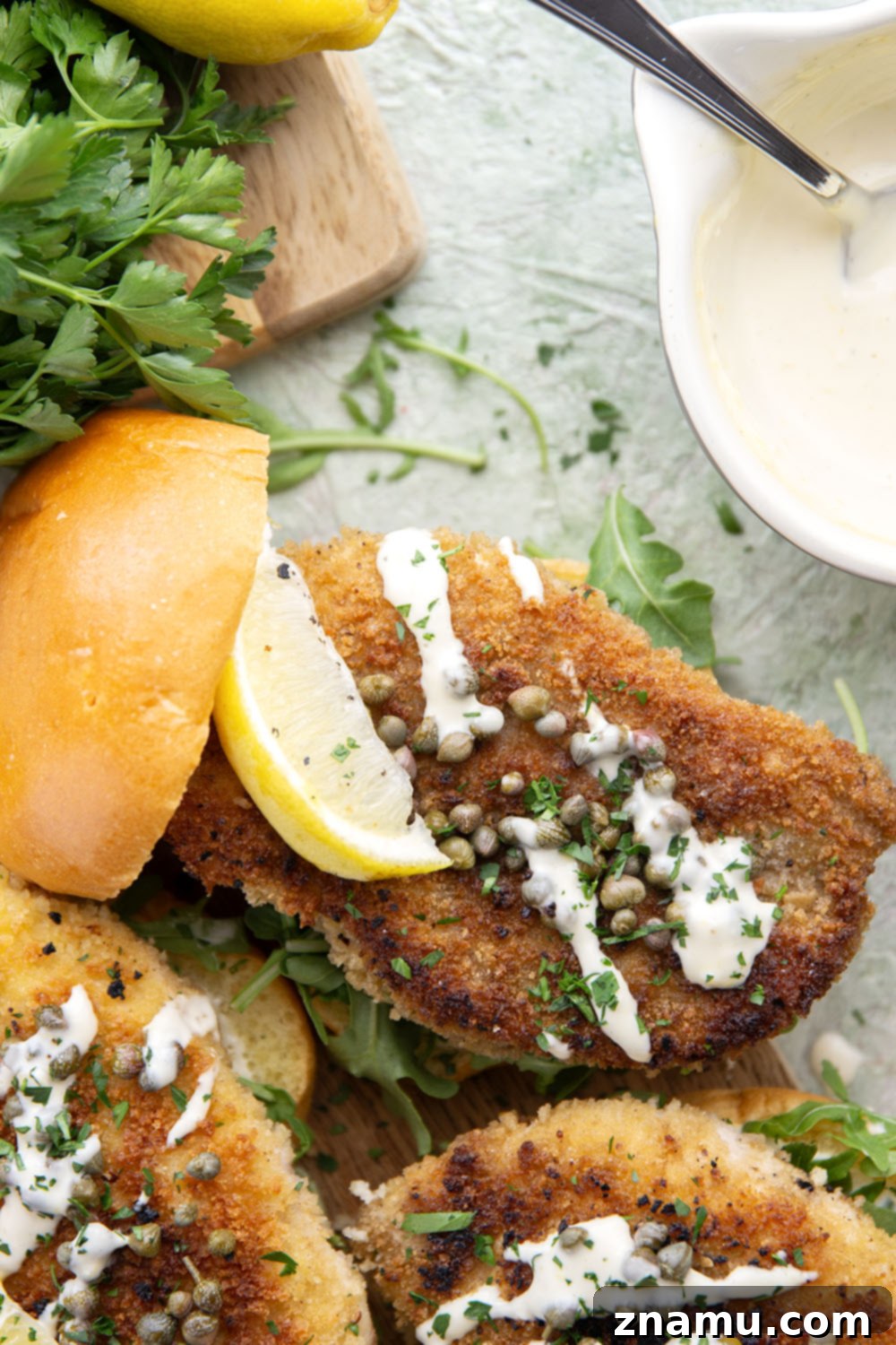 Crispy Chicken Piccata on a Bun 2 Close-up of a delicious Crispy Chicken Piccata Sandwich