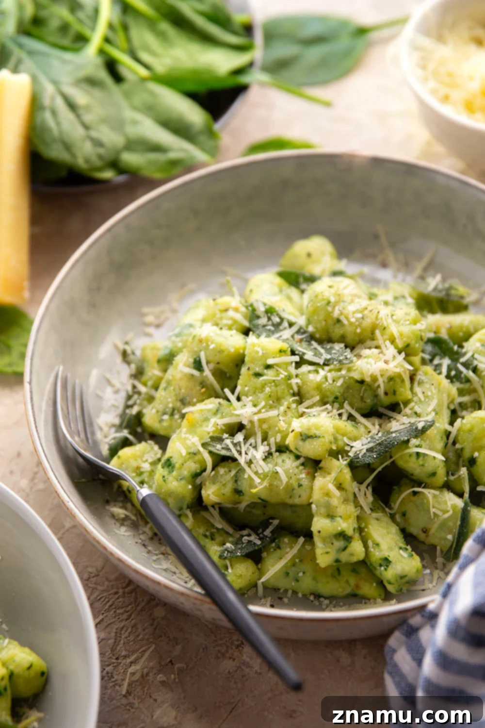 Pillowy Spinach Gnocchi Bliss 3 Light and fluffy homemade spinach gnocchi is packed with vibrant fresh spinach and tossed in a sage browned butter and lots of fresh Parmesan.