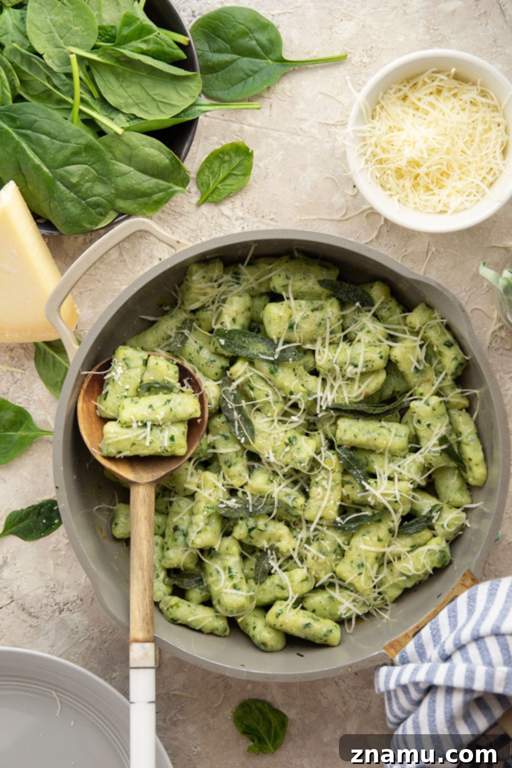 Pillowy Spinach Gnocchi Bliss 4 Light and fluffy homemade spinach gnocchi is packed with vibrant fresh spinach and tossed in a sage browned butter and lots of fresh Parmesan.