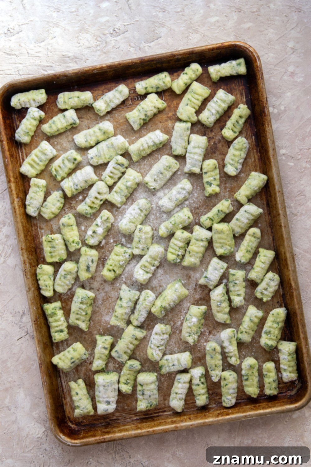 Pillowy Spinach Gnocchi Bliss 5 Light and fluffy homemade spinach gnocchi is packed with vibrant fresh spinach and tossed in a sage browned butter and lots of fresh Parmesan.