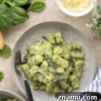 Pillowy Spinach Gnocchi Bliss 8 Light and fluffy homemade spinach gnocchi is packed with vibrant fresh spinach and tossed in a sage browned butter and lots of fresh Parmesan.