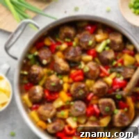 A homemade sweet and sour sauce coats every inch of these juicy sweet and sour meatballs that cook up with colorful peppers and sweet pineapple all in one pan.