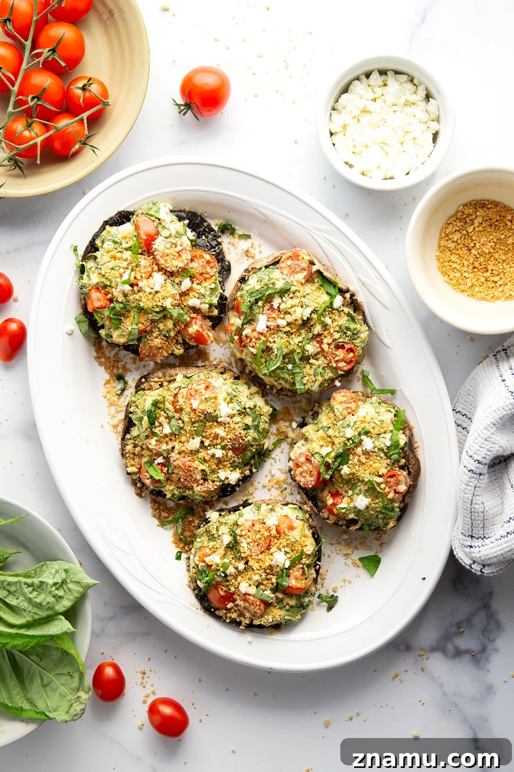 Grilled Portobello Mushrooms Stuffed with Herbed Goat Cheese 4 These stuffed portobello mushrooms include a fresh cherry tomato spinach feta filling stuffed into tender portobello caps and grilled for just a few minutes until perfectly tender and smoky.