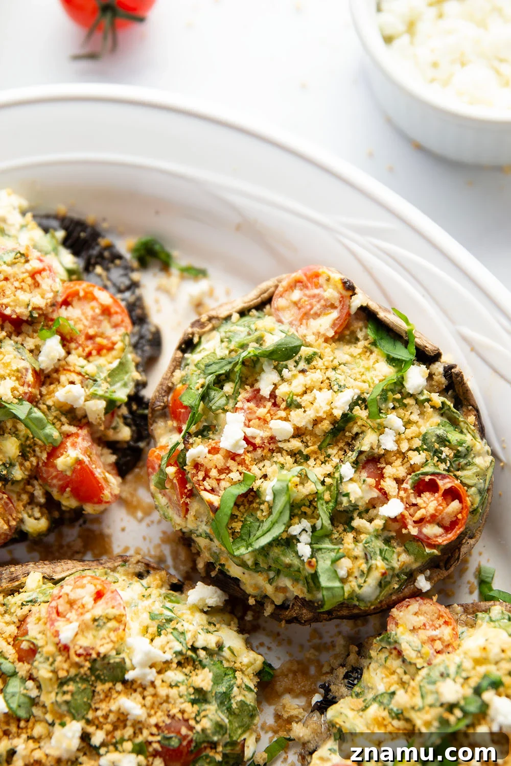 Grilled Portobello Mushrooms Stuffed with Herbed Goat Cheese 6 These stuffed portobello mushrooms include a fresh cherry tomato spinach feta filling stuffed into tender portobello caps and grilled for just a few minutes until perfectly tender and smoky.