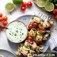 Cilantro-Lime Grilled Salmon Skewers for Summer BBQs 8 Marinated in a fresh cilantro lime sauce and grilled alongside red onion, cherry tomatoes, and served with a cilantro lime crema, these cilantro lime grilled salmon kabobs are a quick dinner to throw on the grill for any occasion.