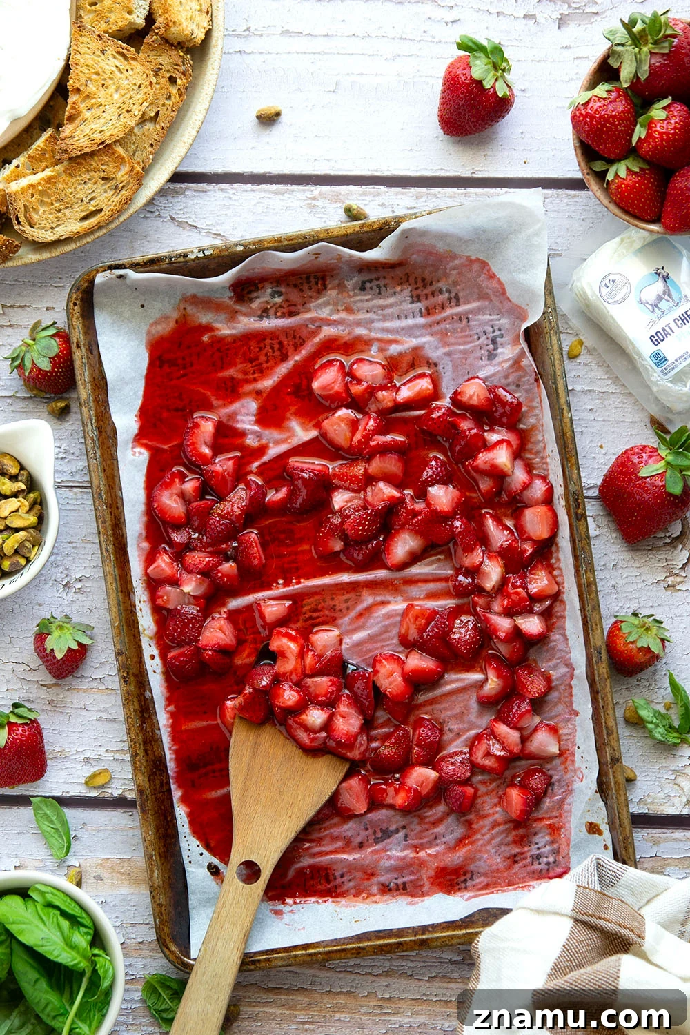 Whipped Goat Cheese with Honey-Roasted Strawberries Recipe 3 Silky whipped goat cheese is topped with juicy honey roasted strawberries and incredible served with crostini for dipping.
