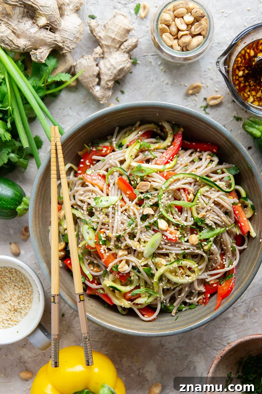 Zucchini Soba Salad with Sesame-Ginger Dressing 6 Zucchini and soba noodles are the perfect salad base in this zucchini soba noodle salad that features crunchy sweet peppers, lots of fresh herbs, and a flavorful fresh ginger sesame dressing.