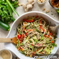 Zucchini Soba Salad with Sesame-Ginger Dressing 8 Zucchini and soba noodles are the perfect salad base in this zucchini soba noodle salad that features crunchy sweet peppers, lots of fresh herbs, and a flavorful fresh ginger sesame dressing.
