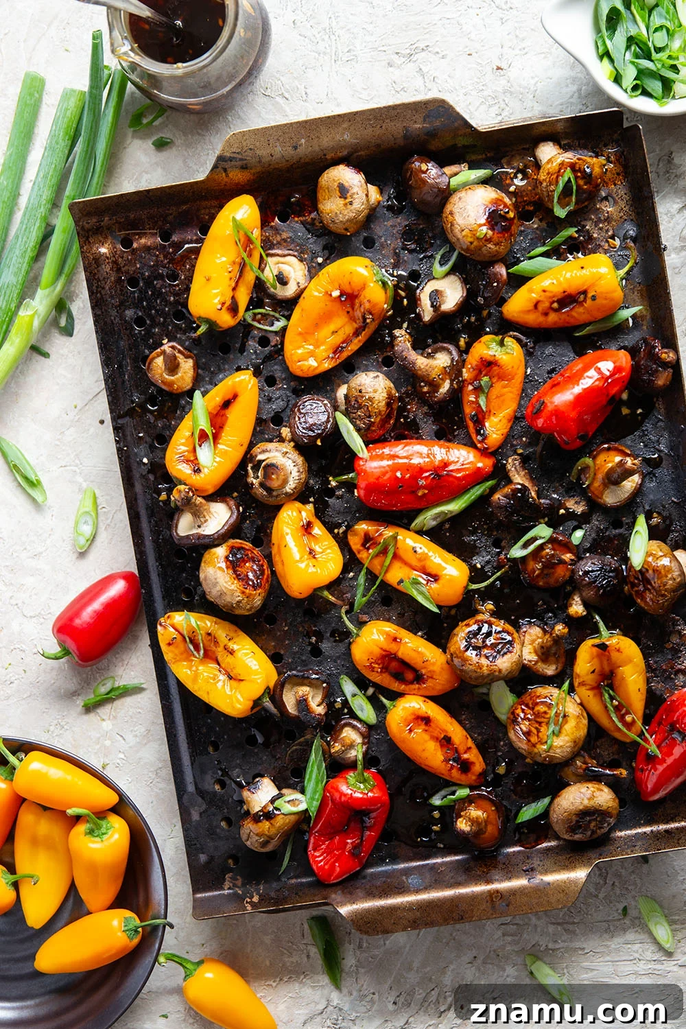 Soy-Marinated Grilled Mushrooms and Peppers 3 A mix of mushrooms and mini sweet peppers are marinated for hours in a flavorful soy marinade, grilled until tender and smoky, and topped with lots of green onions for an easy summer veggie side dish.