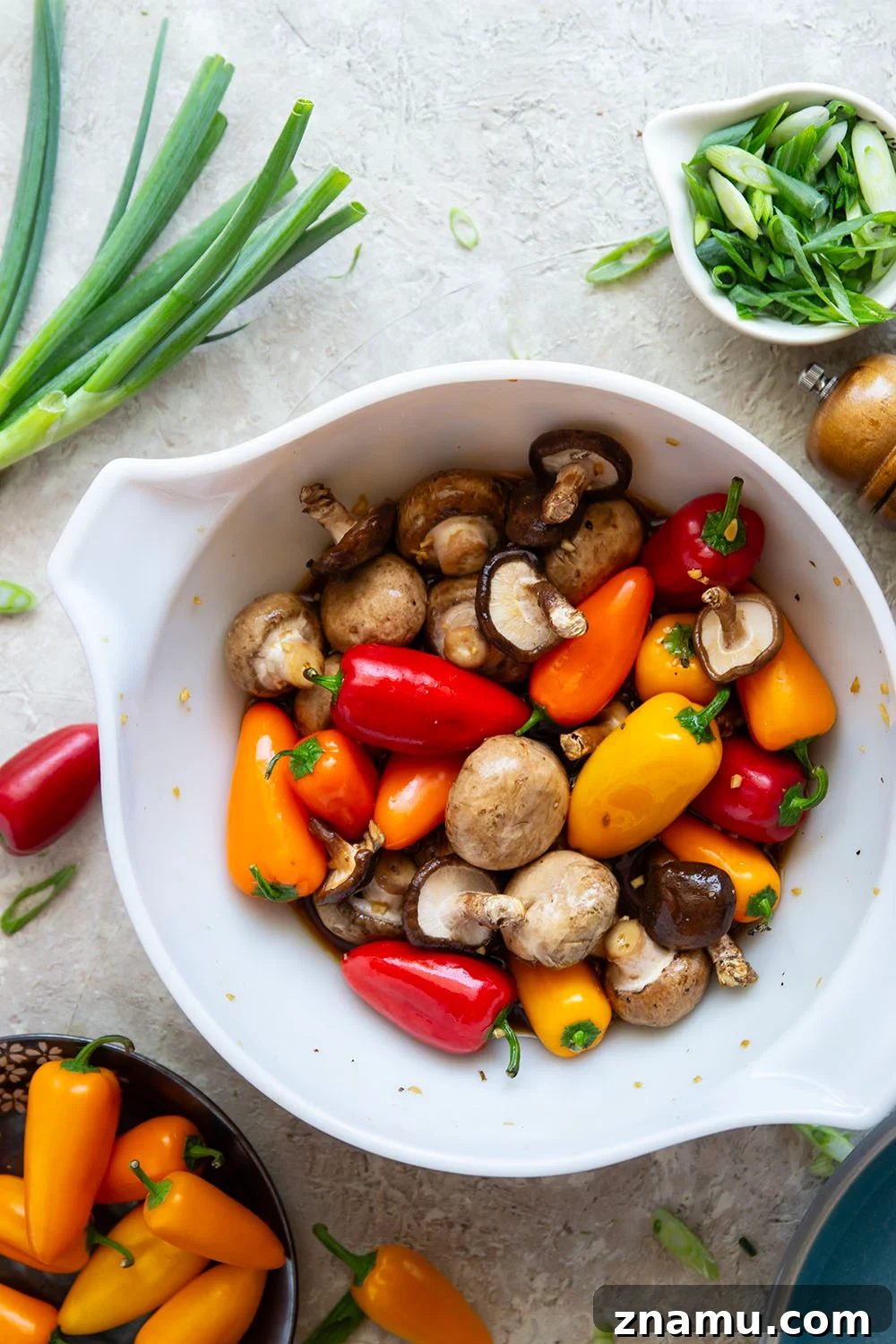 Soy-Marinated Grilled Mushrooms and Peppers 4 A mix of mushrooms and mini sweet peppers are marinated for hours in a flavorful soy marinade, grilled until tender and smoky, and topped with lots of green onions for an easy summer veggie side dish.