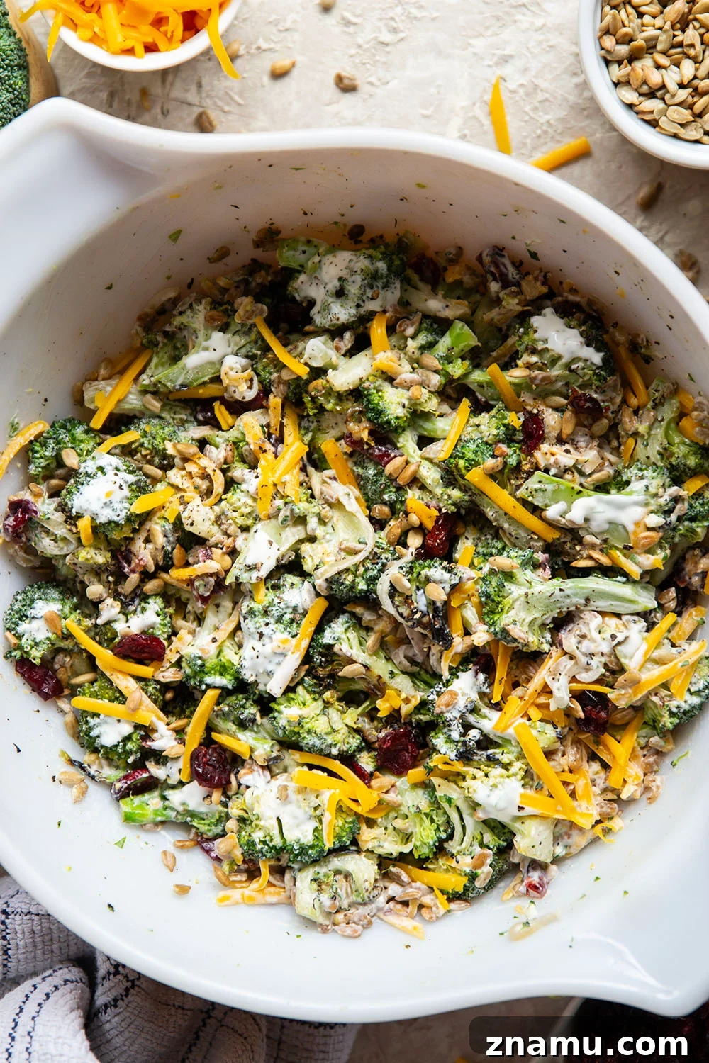 A quick smoky char on broccoli and plenty of freshly shredded cheddar transform this creamy broccoli cheddar salad into a side dish that's always the first to disappear!