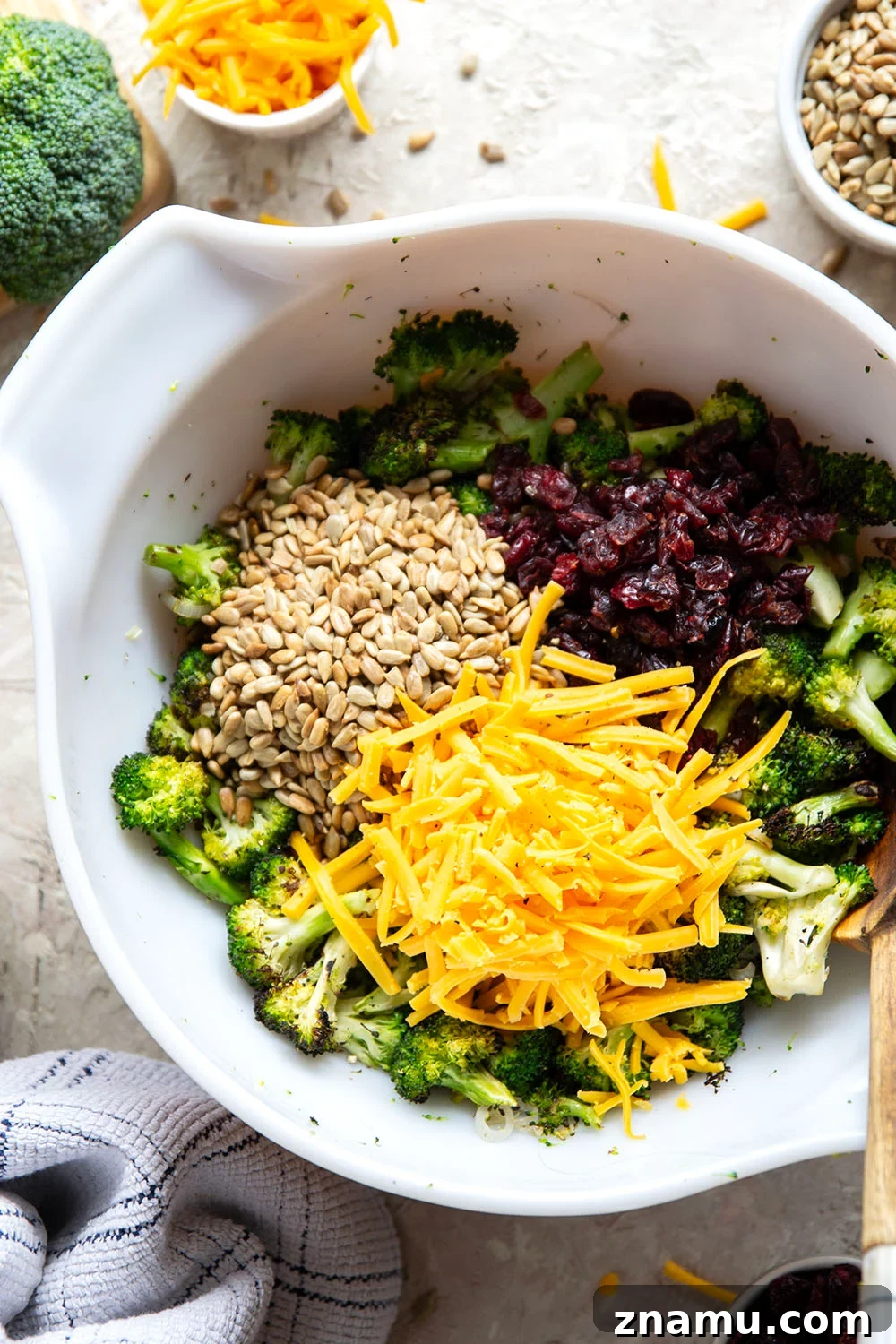 A quick smoky char on broccoli and plenty of freshly shredded cheddar transform this creamy broccoli cheddar salad into a side dish that's always the first to disappear!