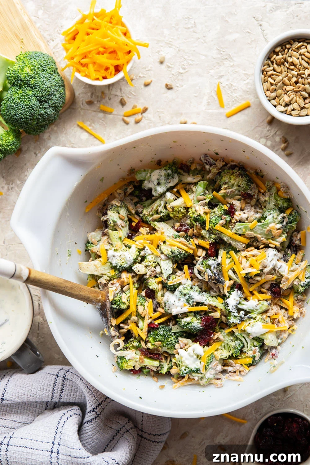 A quick smoky char on broccoli and plenty of freshly shredded cheddar transform this creamy broccoli cheddar salad into a side dish that's always the first to disappear!