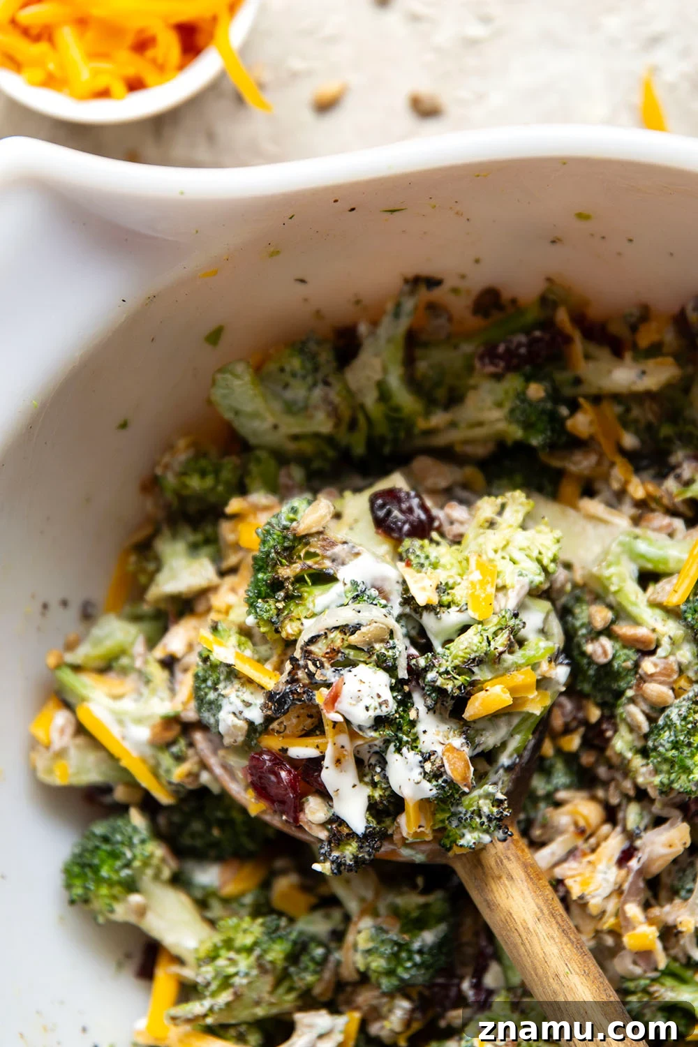 A quick smoky char on broccoli and plenty of freshly shredded cheddar transform this creamy broccoli cheddar salad into a side dish that's always the first to disappear!