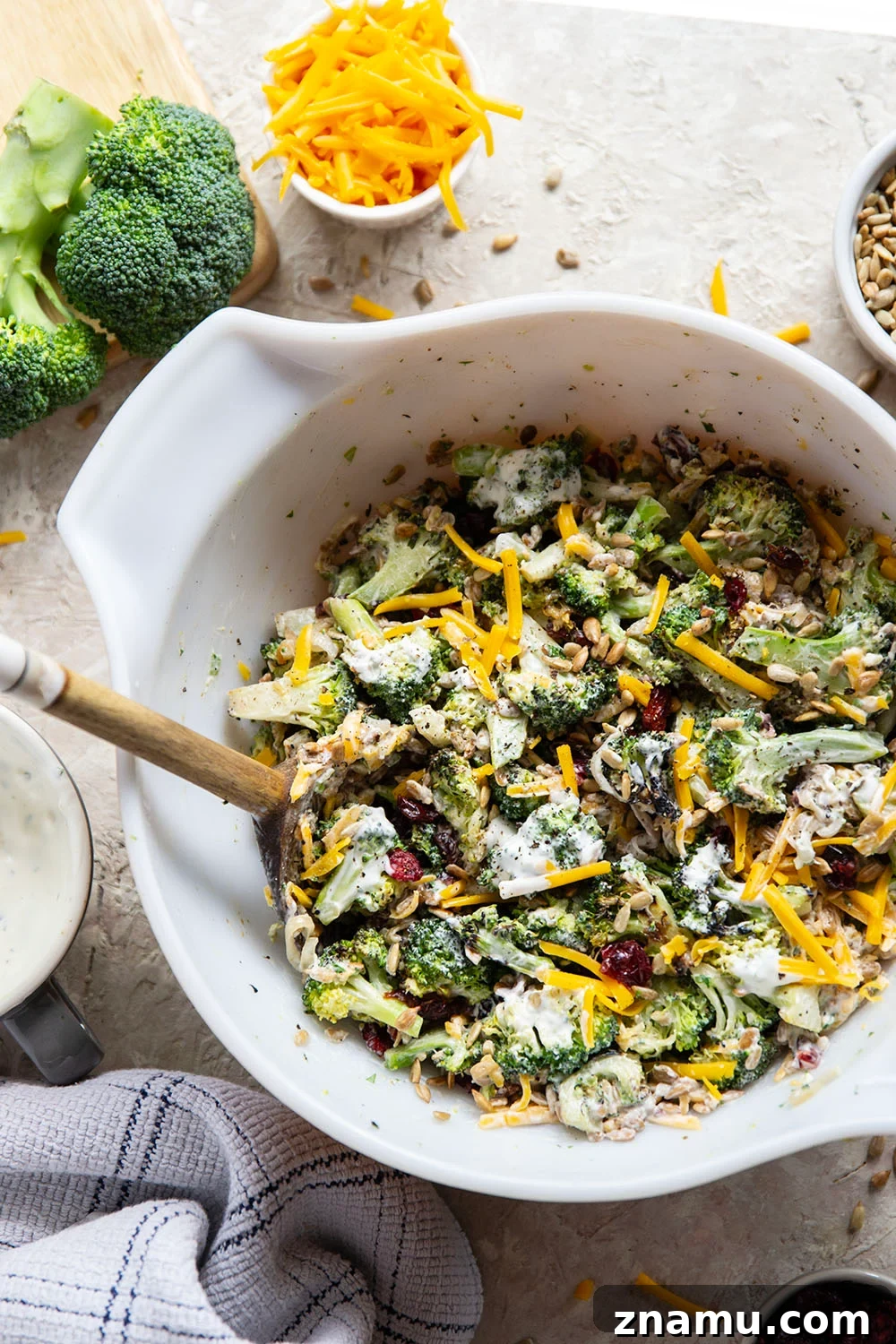 A quick smoky char on broccoli and plenty of freshly shredded cheddar transform this creamy broccoli cheddar salad into a side dish that's always the first to disappear!