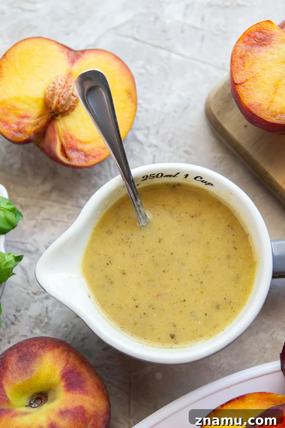 Peach Panzanella: Summer Bread Salad with Basil 3 This summery peach panzanella salad is loaded down with crisp toasted bread, juicy peach slices, sweet tomatoes, and lots of fresh basil. A flavorful shallot dressing drizzled on top adds so much flavor!