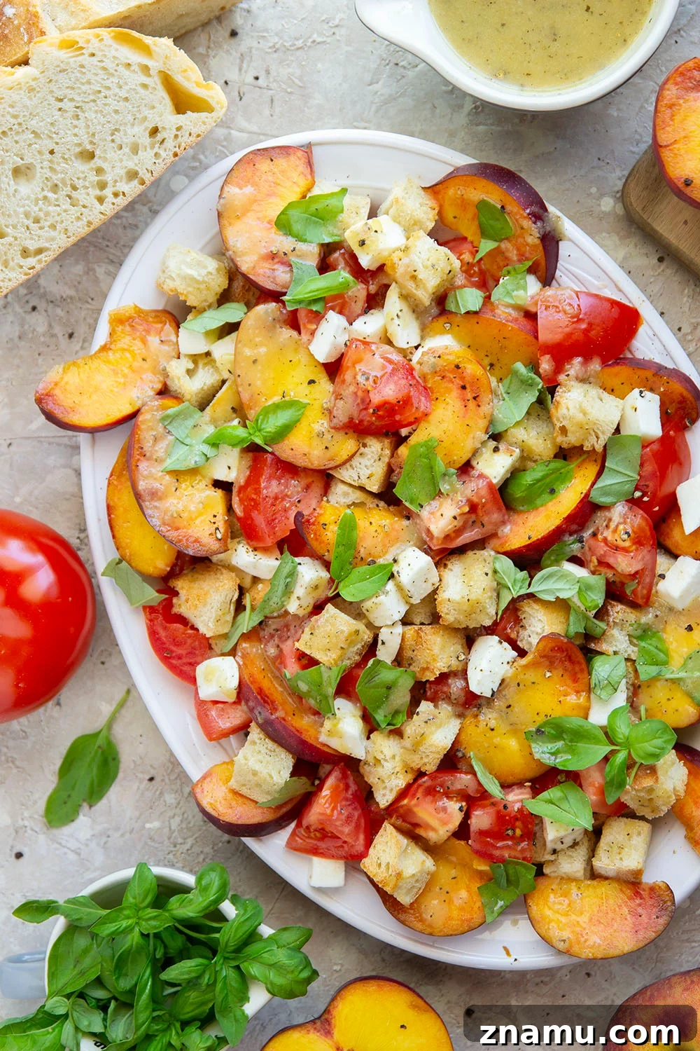 Peach Panzanella: Summer Bread Salad with Basil 4 This summery peach panzanella salad is loaded down with crisp toasted bread, juicy peach slices, sweet tomatoes, and lots of fresh basil. A flavorful shallot dressing drizzled on top adds so much flavor!